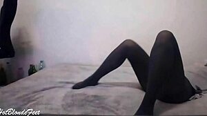 this blonde miley grey shows off her sexy legs in nylon leggings for foot fetish play