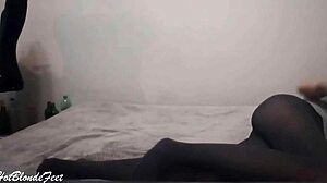 this blonde miley grey shows off her sexy legs in nylon leggings for foot fetish play