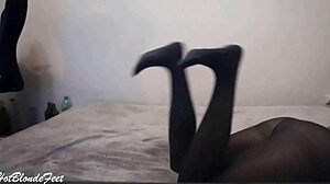 this blonde miley grey shows off her sexy legs in nylon leggings for foot fetish play