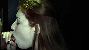 flaming redhead babe loves sucking cock at gloryhole... um, yeah