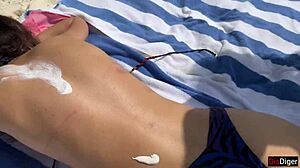 Public beach pickup with stepmom and stepdaughter flashing handjob leads to risky cumshot on face