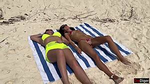 Public beach pickup with stepmom and stepdaughter flashing handjob leads to risky cumshot on face