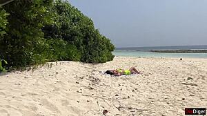 Public beach pickup with stepmom and stepdaughter flashing handjob leads to risky cumshot on face