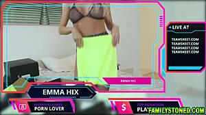 Why is stepdaughter Emma Hix fingering her pussy while unboxing fan gifts on webcam?