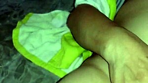 Porn in Chinese features Asian model masturbating with penis in close-up action.