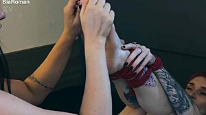 Adorable submissive gets tickled barefoot while bound and choked in femdom foot fetish play