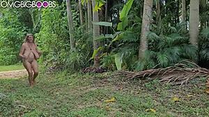 Sexy blonde wife with macromastia contrasts her big saggy tits and hairy pussy on nudist beach