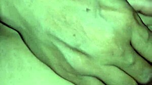 Porn in Chinese features Asian model masturbating with penis in close-up action.