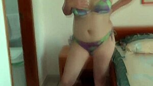 beautiful stepmother on beach shows bikini and touches herself  