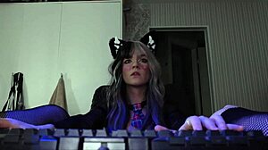 Nerdy gamer reveals level 90 skills as a dominant strapon master in intense play.