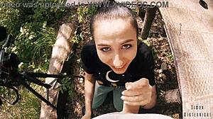 Pov behind the scenes blowjob features teen brunette girlfriend with ponytail giving handjob and swallow in outdoor forest setting.