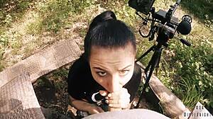 Pov behind the scenes blowjob features teen brunette girlfriend with ponytail giving handjob and swallow in outdoor forest setting.