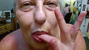 Pretty mature woman fingers hairy pussy in orchid lace panties