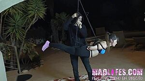 Brunette gets bound and tied to the ceiling in this European reality Spanish scene.