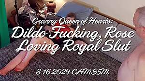 granny dressed as queen of hearts plays with toy in rose themed royal costume