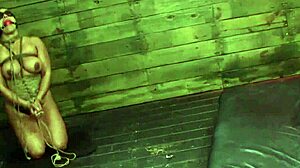 The domina blindfolds the lesbian sub for intense bdsm strapon fucking in group domination scene. She fingers and licks while bound.