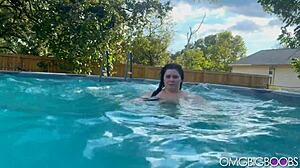 Curvy babe displays her big tits in a playful show