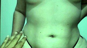 The married stepsister kneels down to suck cock and takes all my cum in her mouth during a blowjob session.