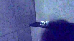 Asian slut wife uses dildo and vibrator for masturbation in gym shower