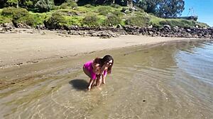 Curvy milf cums hard with big exotic dildo on the beach!
