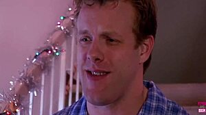 Blonde babe with massive fake tits celebrates Christmas by getting her pussy drilled deep by a well-endowed stud