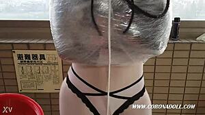 Asian In Bondage With 1mm Rubber Mask And Catsuit Bound Outdoors In Latex Fetish Scene