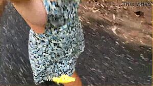 Wife dares to flash big tits with sideboob while running nude in public outdoor spot.