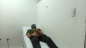 Kinky doctor masturbates his cock in the office during a private moment.