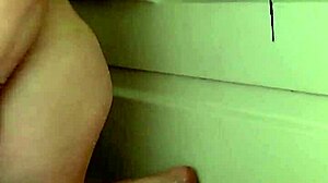 Neighbor caught me showering and masturbating with dildo leading to cum on tits.