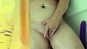 Neighbor caught me showering and masturbating with dildo leading to cum on tits.