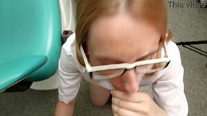 Dentist with glasses kneels down to suck cock until facial cumshot in hospital setting