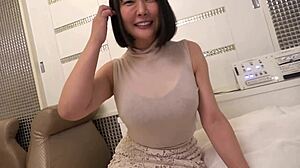 I found this secret video showing a Japanese K-cup justy milf in see-through shorts