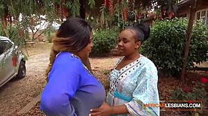 Whoa, these African milf lesbians are making out wildly in public at that house party!