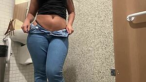 Brazilian teen fingering big pussy lips in shopping bathroom
