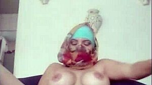 Real amateur arab in hijab niqab feels intense squirting orgasm on webcam while husband away