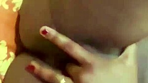 Amateur homemade lesbian video features shaved pussy in retro blue films style