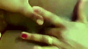 Amateur homemade lesbian video features shaved pussy in retro blue films style