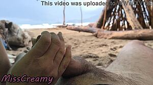 Misscreamy grips my cock for intense handjob during stormy public beach sex in 4k