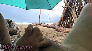 Misscreamy grips my cock for intense handjob during stormy public beach sex in 4k