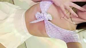 Ki-sim uses a dildo to reach intense orgasm in this skinny tattooed teen solo session