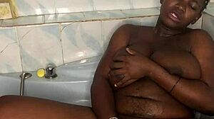 bathroom squirting session with huge black dildo in european solo action