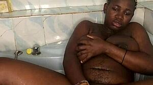 bathroom squirting session with huge black dildo in european solo action