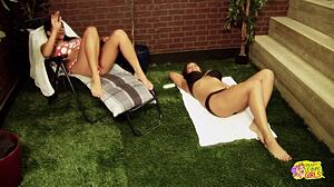 busty brunette girlfriends shift from backyard sunbathing to intense lesbian pussy licking and fingering session