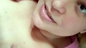 blonde contrasts masturbation in intriguing bed tease with contact details for more