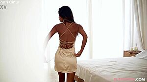 why is putri cinta unwinding in this asian model scene with such seductive moves?