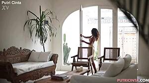 why is putri cinta unwinding in this asian model scene with such seductive moves?