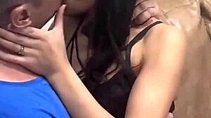 young brazilian girl kissing her athletic boyfriend in homemade video