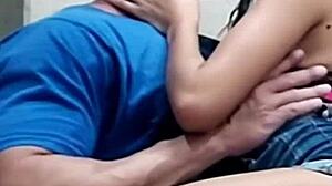 young brazilian girl kissing her athletic boyfriend in homemade video