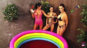 Three Nasty Brunette Lesbians Wrestle Naked In Jelly Pool Licking Big Asses And Tits