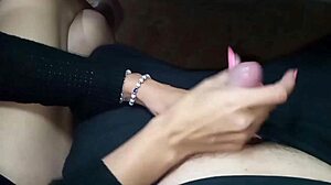 Argentinian mommy gives handjob under table until cumshot covers her tits